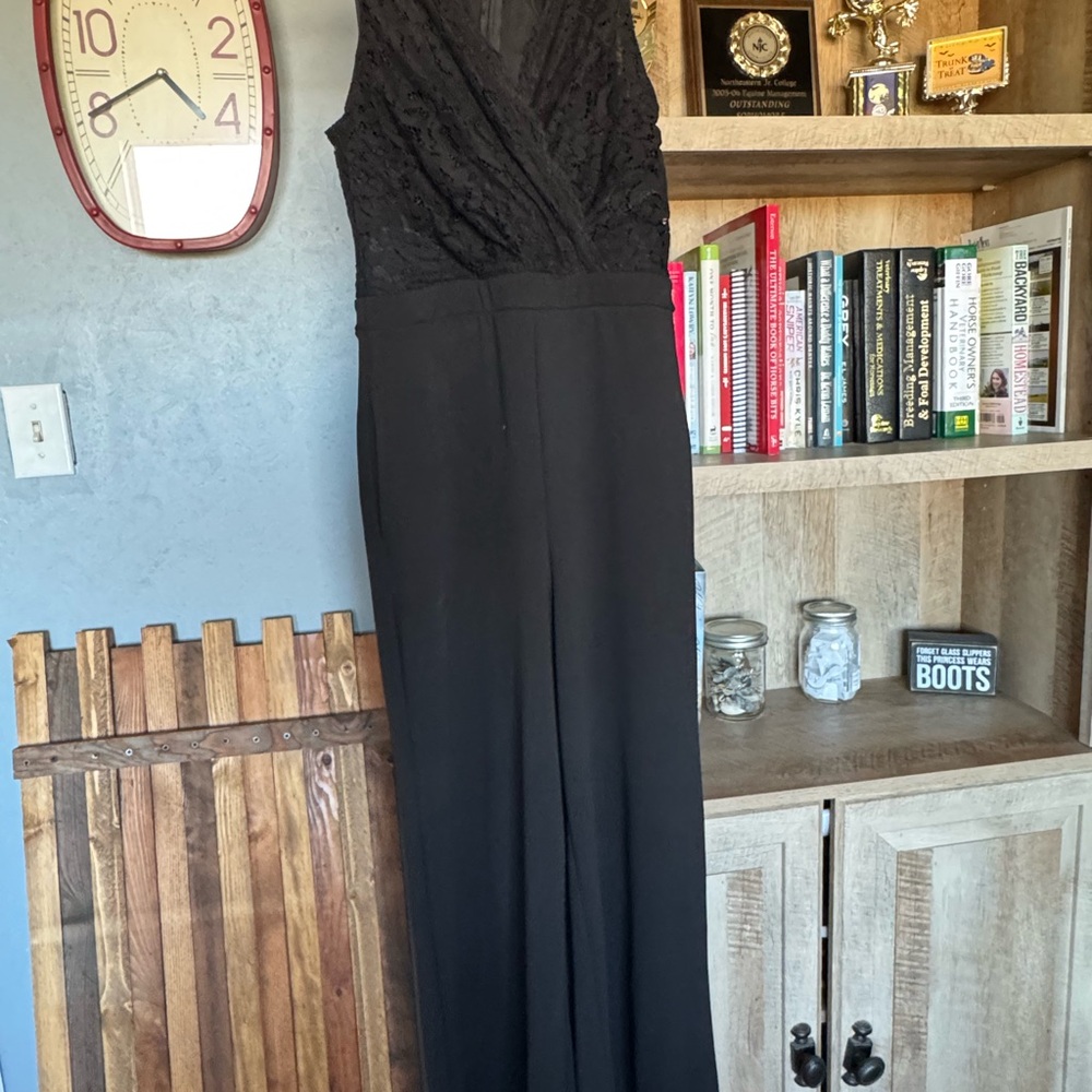 Black romper with a lace top